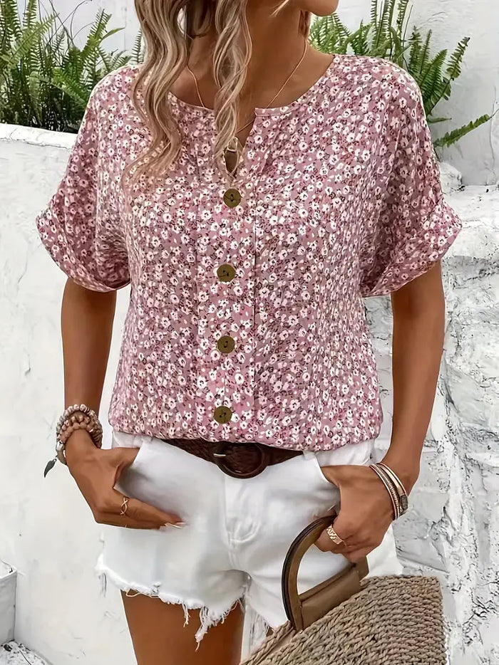 Women’s floral print blouse by LondonLaneStore, lightweight and breathable summer top with flowing fabric and vibrant floral design.