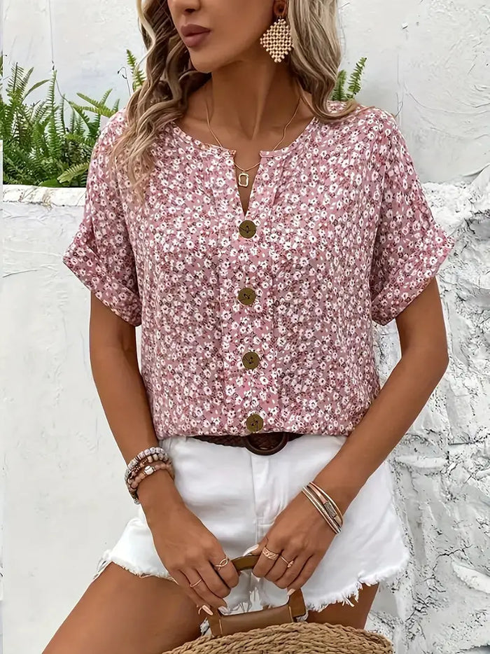Women's breathable floral print blouse from LondonLaneStore, lightweight flowing summer top with vibrant floral pattern.