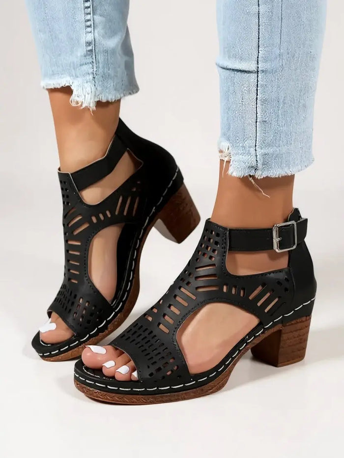 Women's breathable leather orthopedic block heel sandals with elegant cutout design, perfect for summer wear.