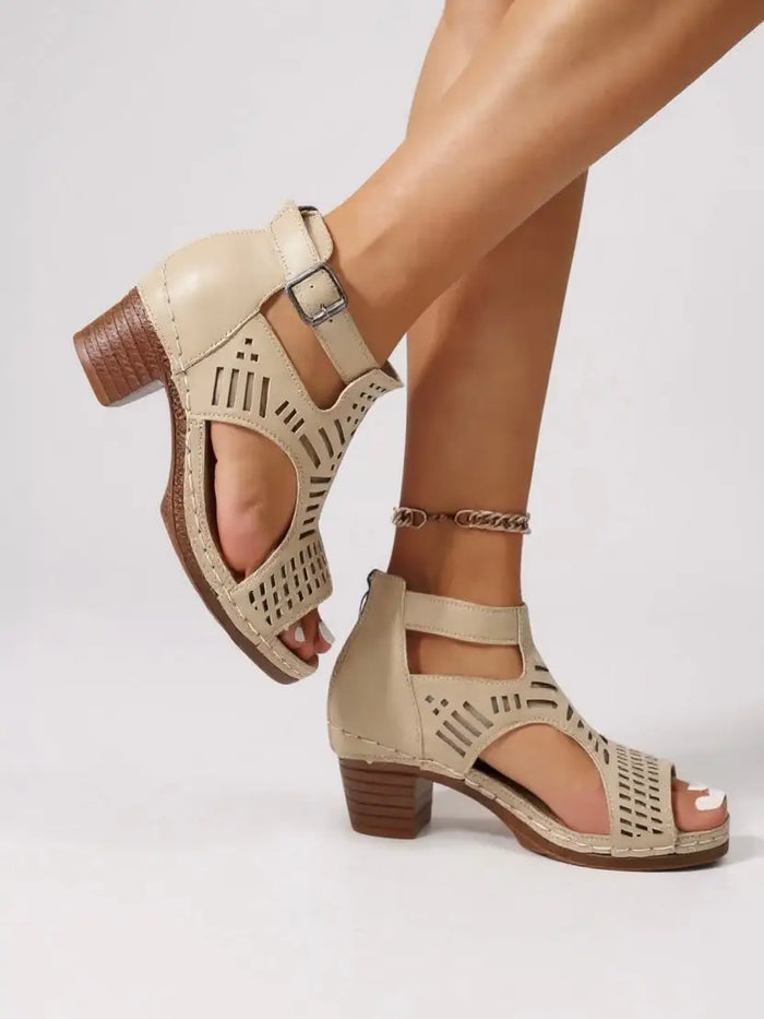 Women's breathable leather orthopedic block heel sandals with elegant cutout design, perfect for summer comfort and style.