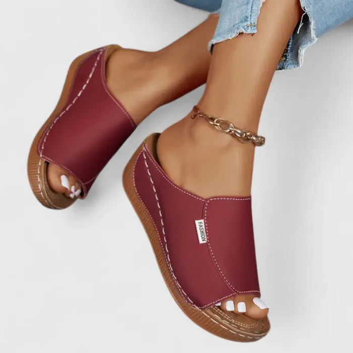 Women’s breathable leather orthopedic sandals with stylish design and comfortable summer footwear features, perfect for warm weather.