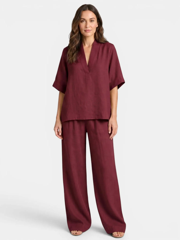 Women's breathable linen co-ord set from LondonLaneStore featuring relaxed V-neck top and wide-leg trousers, ideal for casual wear.