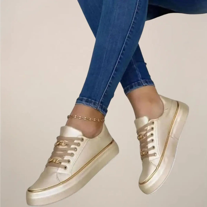Women's casual fabric sneakers by LondonLaneStore featuring stylish white low-top trainers with gold accents and comfortable design.