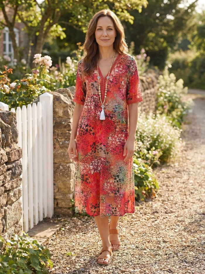 Women's colorful printed midi dress by LondonLaneStore featuring a relaxed fit, perfect for casual summer wear.