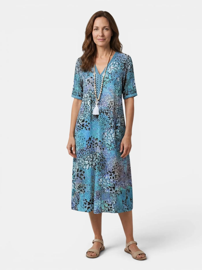 Women's colorful printed midi dress by LondonLaneStore, relaxed fit summer dress with vibrant floral pattern for casual wear.