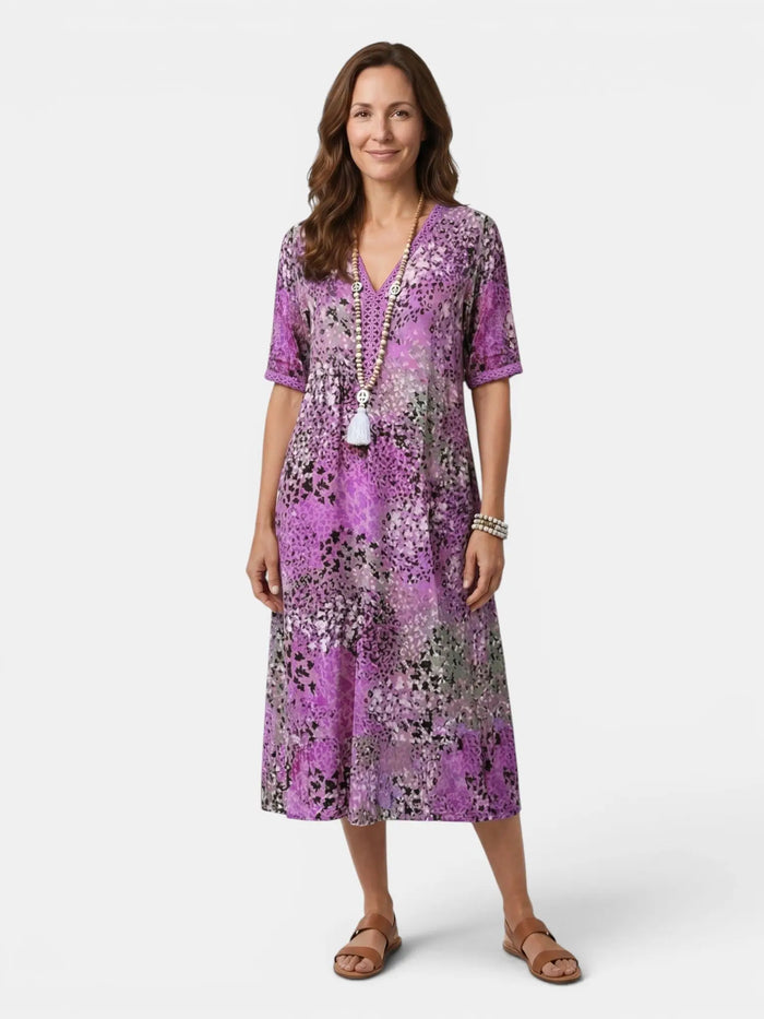 Women’s colorful printed midi dress by LondonLaneStore featuring a relaxed fit, perfect for casual summer wear.