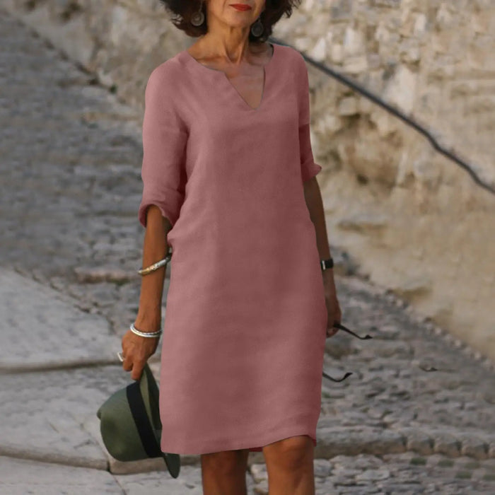 Women's V-neck midi dress from LondonLaneStore with 3/4 sleeves, casual elegant style, perfect for everyday wear.