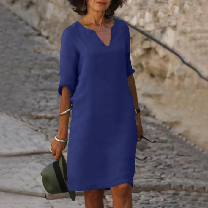 Women's V-neck midi dress with 3/4 sleeves from LondonLaneStore, featuring a comfortable, casual shift style in elegant design.