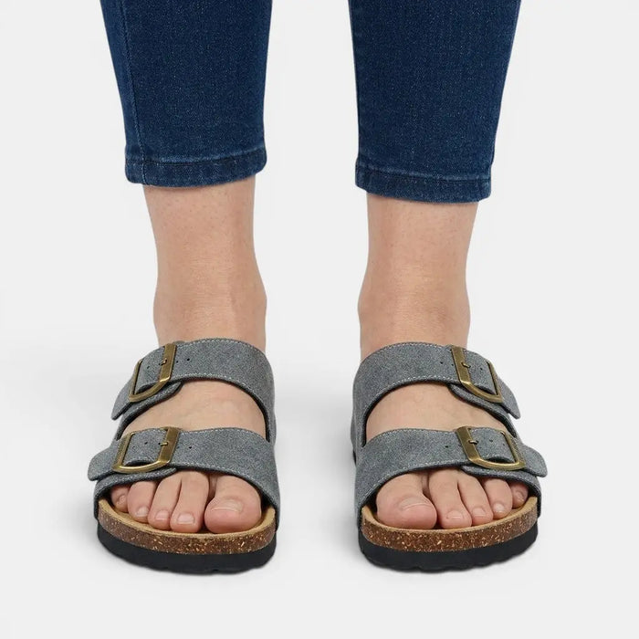 Women's cork footbed sandals with open toes and orthopedic support, featuring comfortable design and stylish straps.