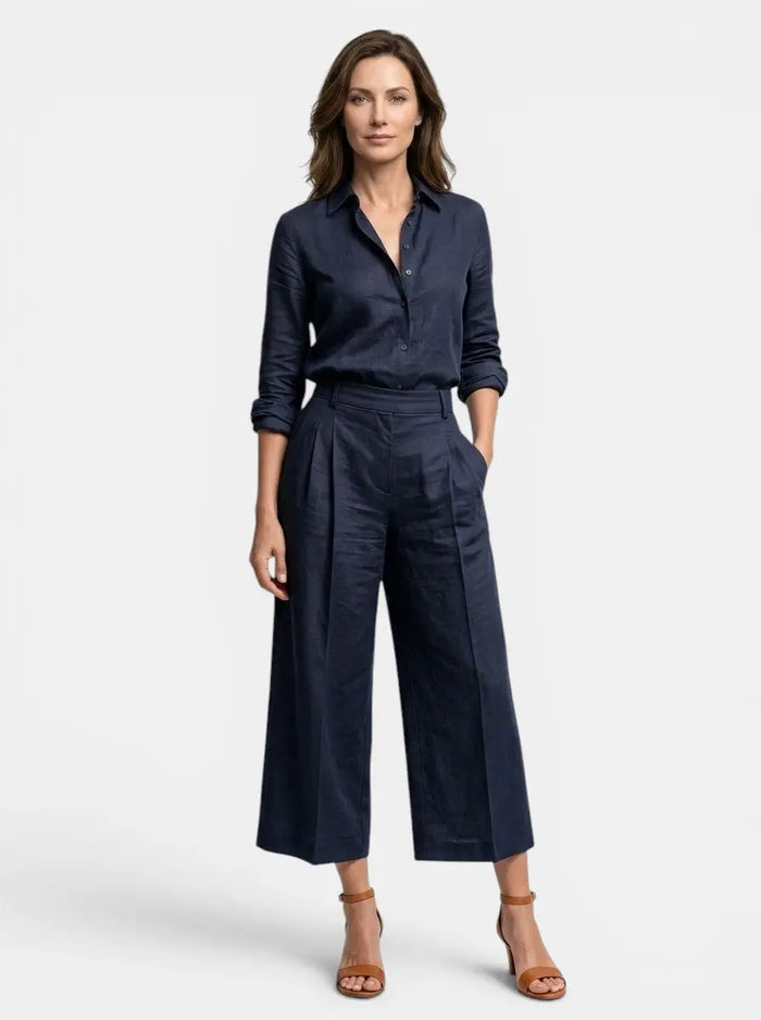 Women's cotton blend loungewear set with relaxed button-down shirt and high-waist trousers, casual and comfortable for lounging.