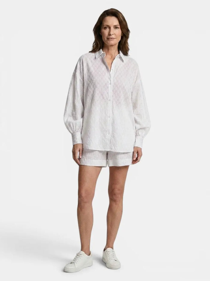Women's cotton broderie stripe short set by LondonLaneStore featuring a relaxed, oversized summer outfit with a breezy, stylish design.