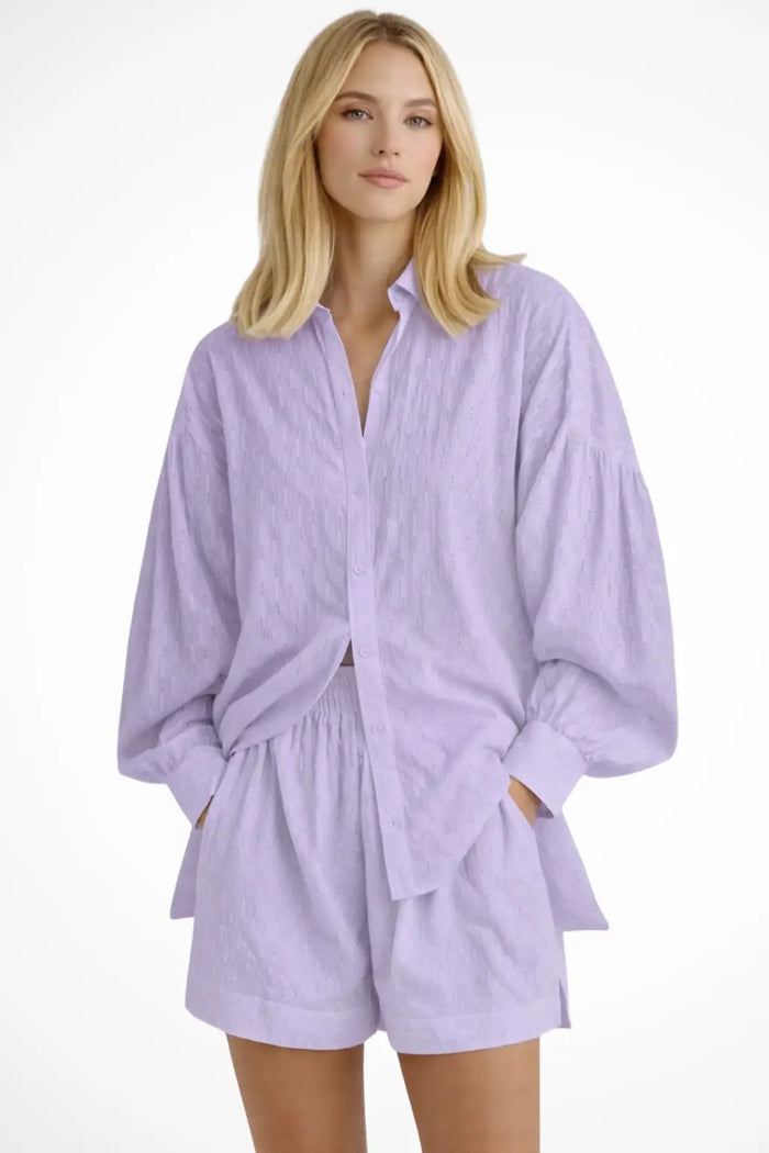 Women’s cotton broderie summer two-piece set with relaxed oversized shirt and shorts, perfect for casual warm-weather wear.