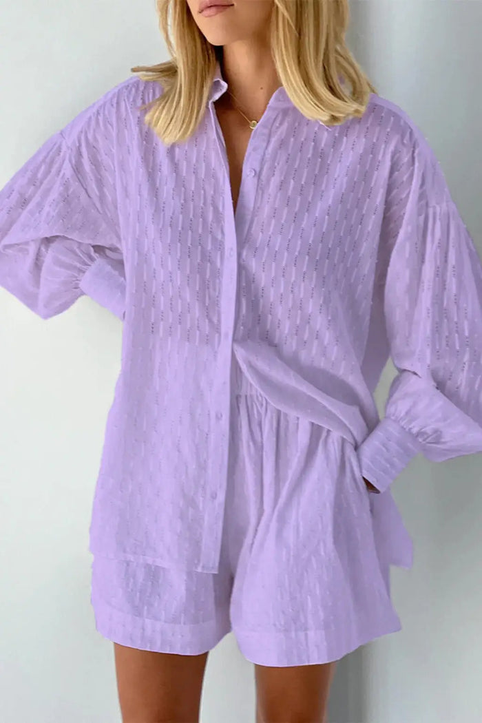 Women’s cotton broderie summer two-piece suit with relaxed oversized shirt and shorts, featuring intricate embroidery and breathable fabric.