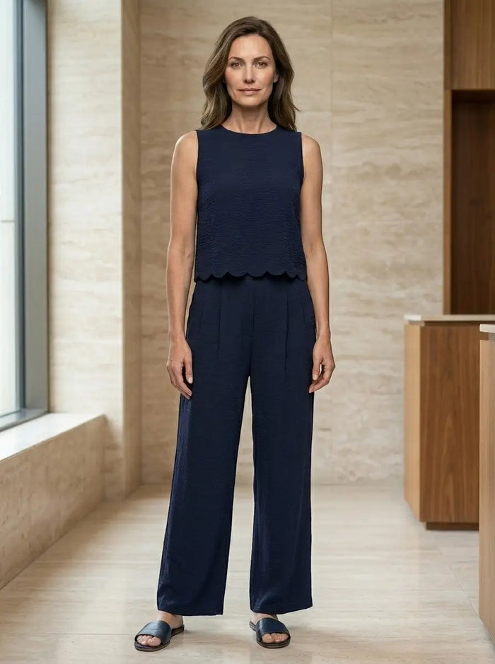 Women's crinkle fabric co-ord set with sleeveless top and wide-leg trousers, relaxed fit, stylish and comfortable for casual wear.