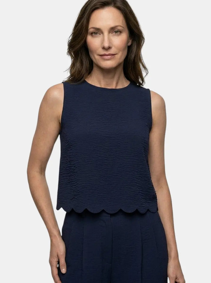 Women's crinkle fabric co-ord set with relaxed sleeveless top and wide-leg trousers, stylish and comfortable casual outfit.