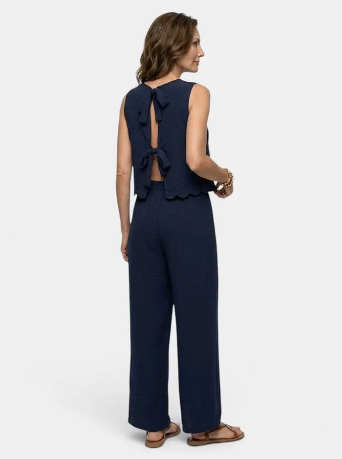 Women's crinkle fabric co-ord set with relaxed sleeveless top and wide-leg trousers, stylish LondonLaneStore ensemble.