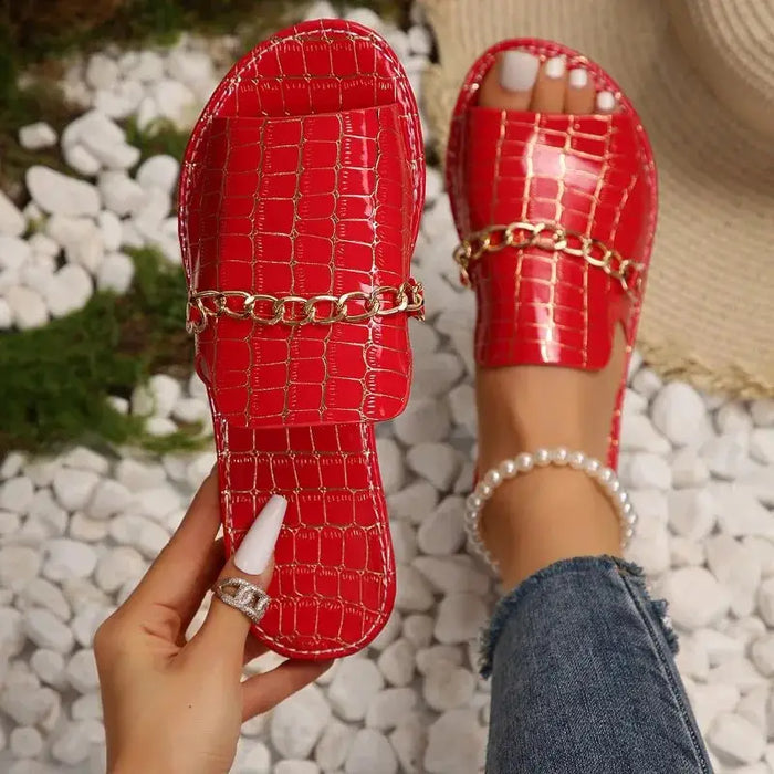 Women’s croc-embossed sandals by LondonLaneStore, stylish and comfortable summer footwear featuring textured croc pattern.