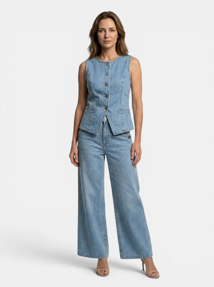 Women’s denim co-ord set featuring a tailored waistcoat and wide-leg trousers, styled for a modern, casual look.