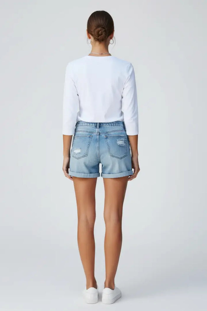 Women's distressed denim shorts with relaxed fit and fringe hem, stylish summer bottoms by LondonLaneStore.
