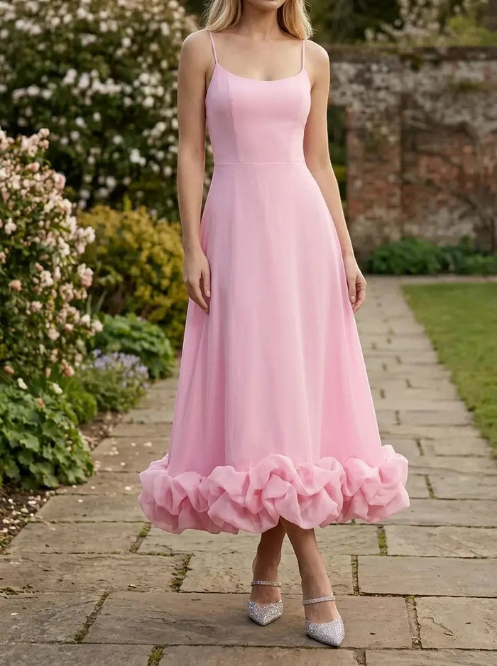 Women's elegant fabric midi evening dress with flattering ruffle design, featuring a stylish silhouette and sophisticated look.