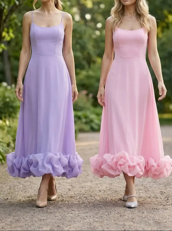 Women’s elegant fabric midi evening dress with flattering ruffle design, showcasing a sophisticated, flowing style.