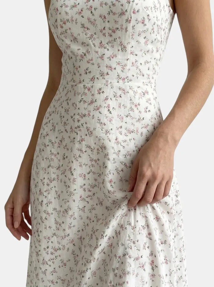 Women's elegant fabric midi evening dress with flattering ruffle design, featuring a stylish silhouette and sophisticated look.