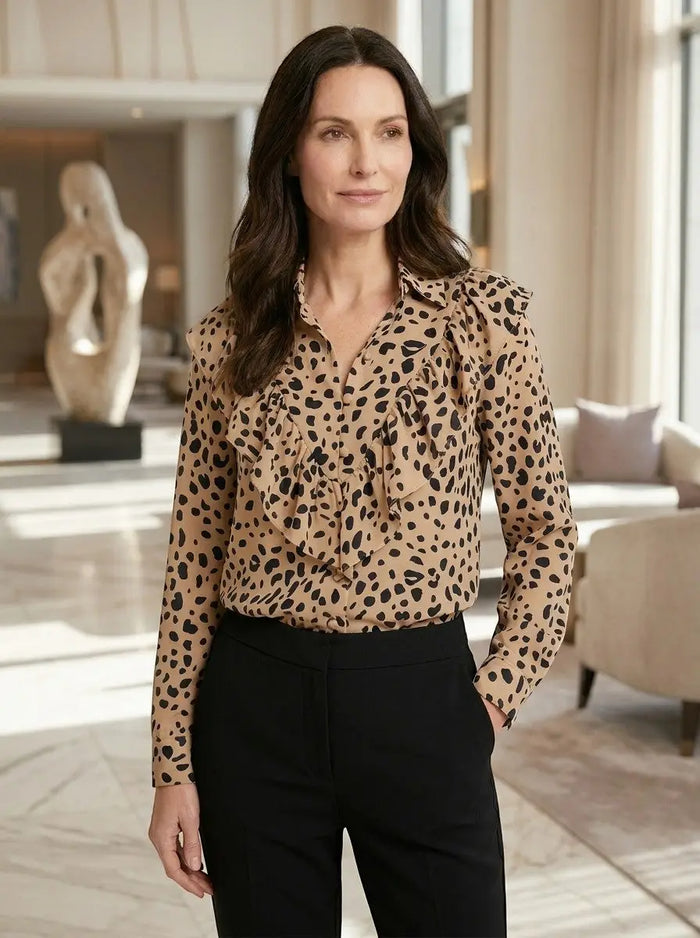 Women's leopard print long sleeve blouse from LondonLaneStore, stylish all-season top with elegant design and trendy pattern.
