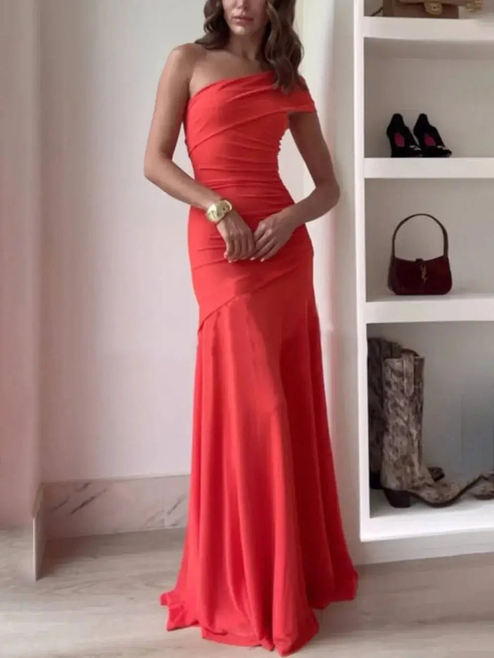 Women’s elegant maxi dress with asymmetric neckline and gathered details, perfect for formal evening occasions.