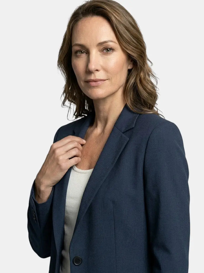 Women’s elegant navy blue suit with tailored blazer and straight-leg trousers, stylish professional outfit from LondonLaneStore.