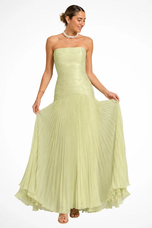 Women's elegant strapless pleated maxi dress with drop waist, featuring flowing fabric and sophisticated style by LondonLaneStore.