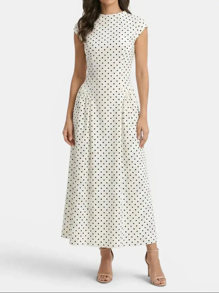 Women's elegant polka dot maxi dress by LondonLaneStore featuring chic cap sleeves and an A-line summer gown silhouette.