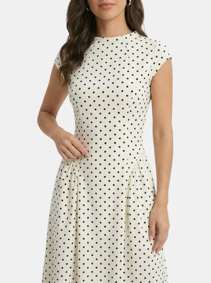 Women’s elegant polka dot maxi dress with cap sleeves and A-line silhouette, perfect for summer, by LondonLaneStore.
