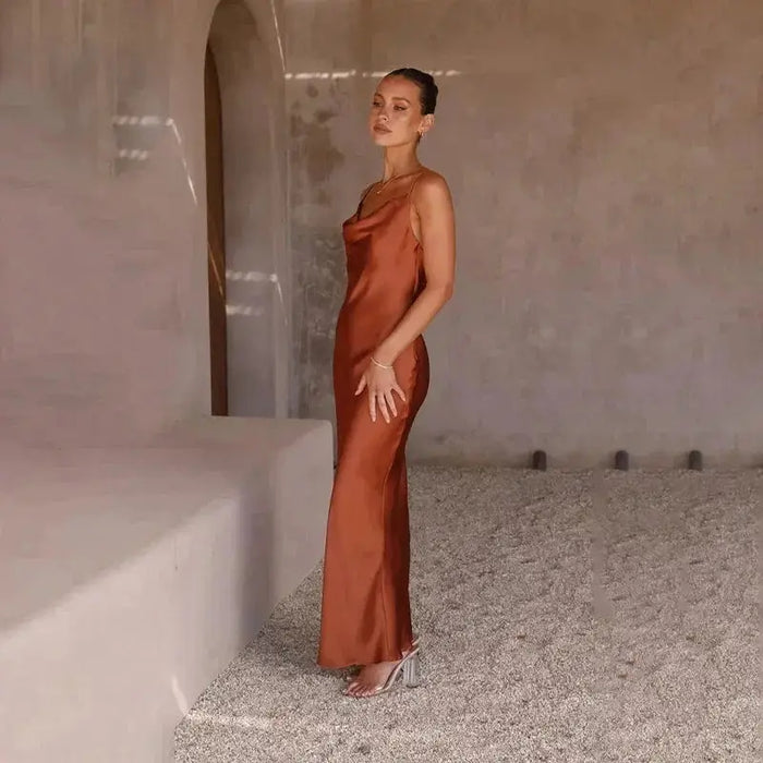 Elegant women's satin maxi dress with sleeveless design and draped cowl neck, perfect for formal occasions, by LondonLaneStore.