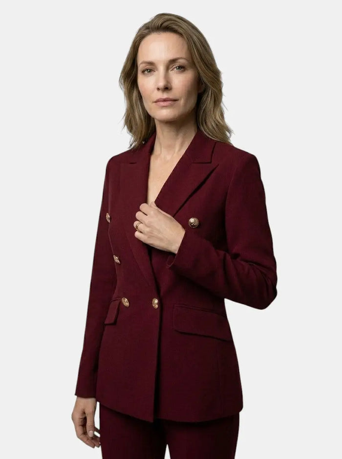 Elegant women's white suit from LondonLaneStore featuring a tailored double-breasted blazer and flared trousers.