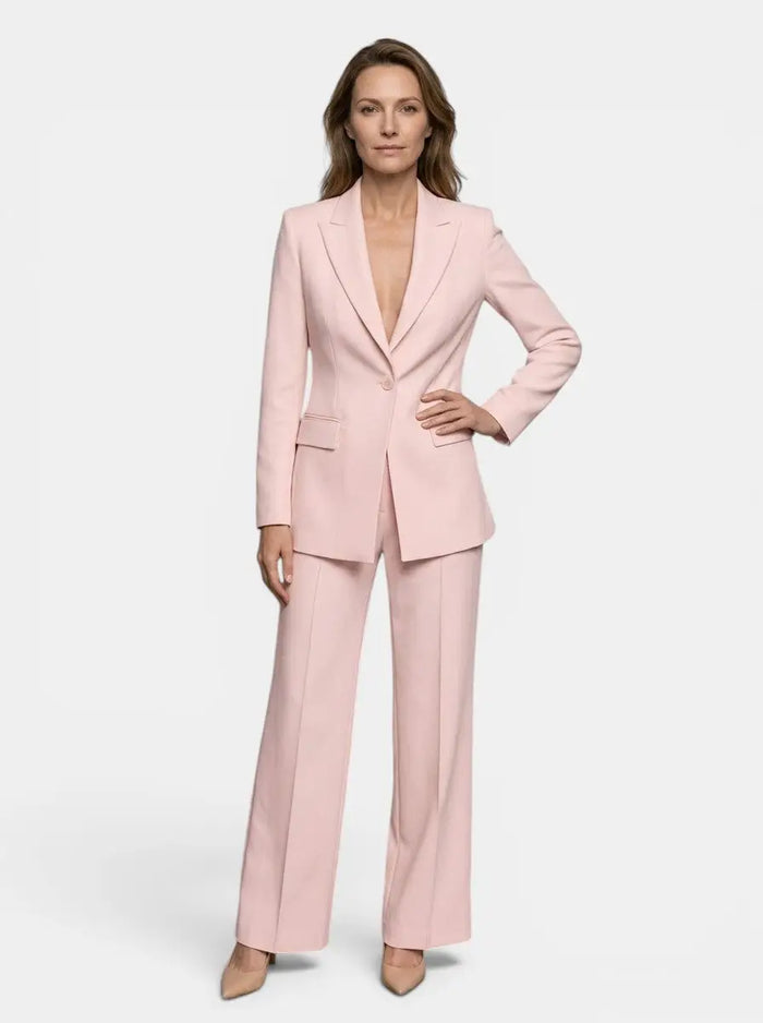 Women's elegant tailored blazer suit featuring a white longline blazer and wide-leg trousers, stylish and sophisticated for women.