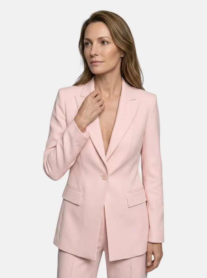 White women's tailored blazer suit with longline blazer and wide-leg trousers, elegant and sophisticated fashion ensemble.