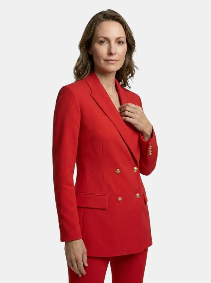 Women's elegant trouser suit featuring a stylish double-breasted blazer and high-waist flared trousers, perfect for formal occasions.