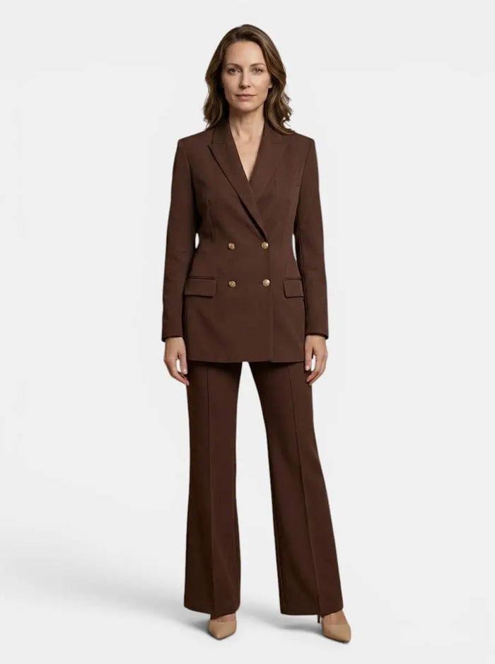 Elegant women's trouser suit featuring a double-breasted blazer and high-waist flared trousers, perfect for sophisticated office wear.