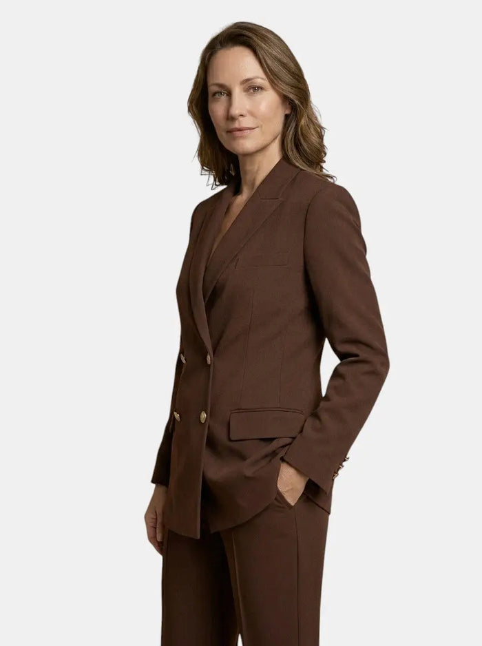 Elegant women's trouser suit featuring a stylish double-breasted blazer and high-waist flared trousers, perfect for formal occasions.