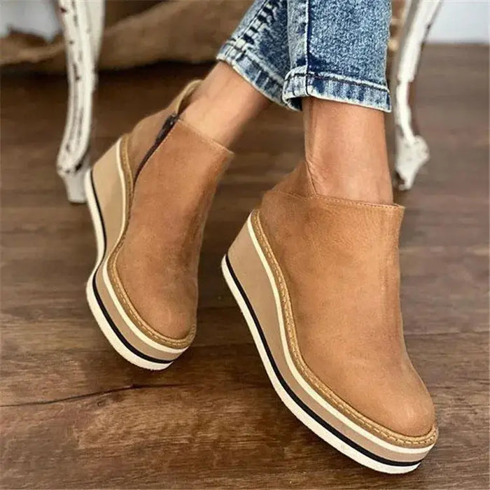 Women's waterproof boots with stylish orthopedic design for autumn and winter, featuring a sleek, elegant look and durable sole.
