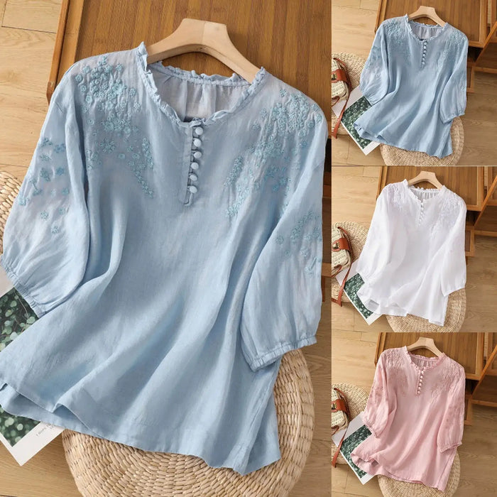 Women's embroidered cotton blouse from LondonLaneStore, elegant white summer top with classic button-front design.
