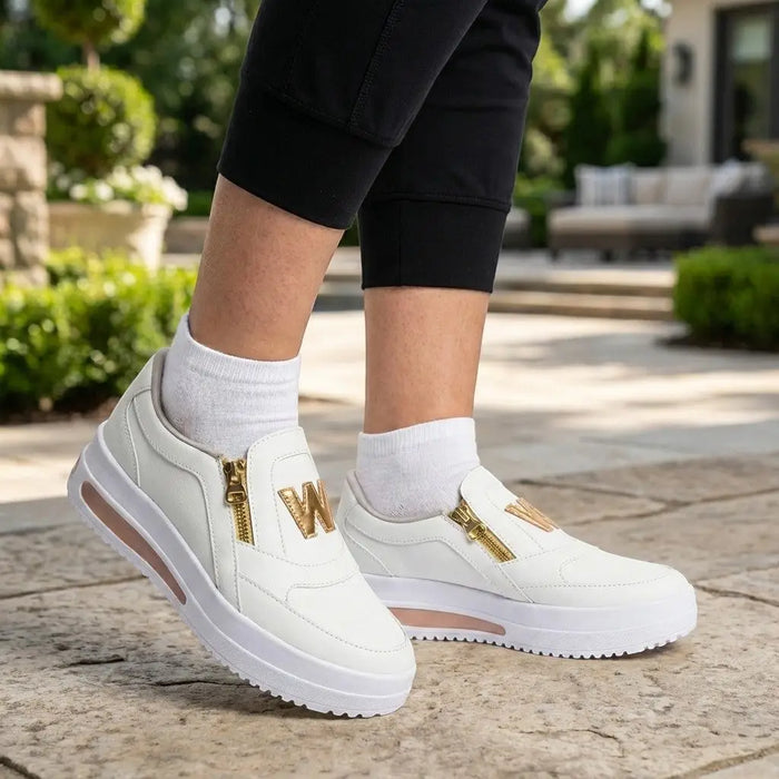 Women's fabric slip-on sneakers by LondonLaneStore featuring a chic casual design with zipper detail, perfect for everyday comfort.