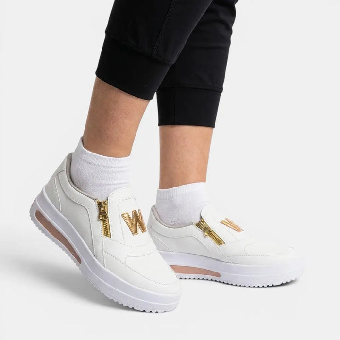Women's fabric slip-on sneakers by LondonLaneStore featuring casual style and zipper detail, designed for comfort and ease of wear.
