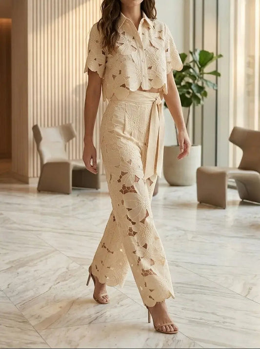 Women's floral lace co-ord set with elegant cropped top and wide-leg trousers, perfect for spring and summer occasions.
