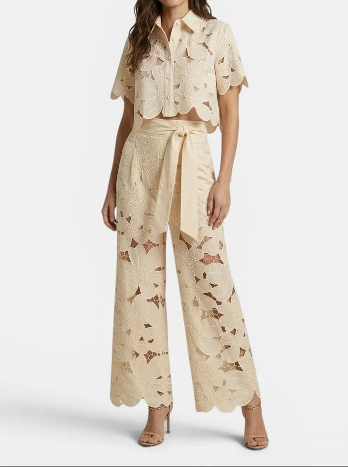 Women's floral lace co-ord set featuring an elegant cropped top and wide-leg trousers for spring and summer.
