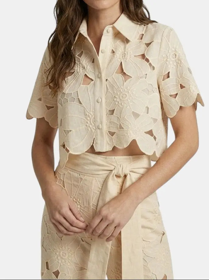 Women's floral lace co-ord set with elegant cropped top and wide-leg trousers, perfect for spring and summer.
