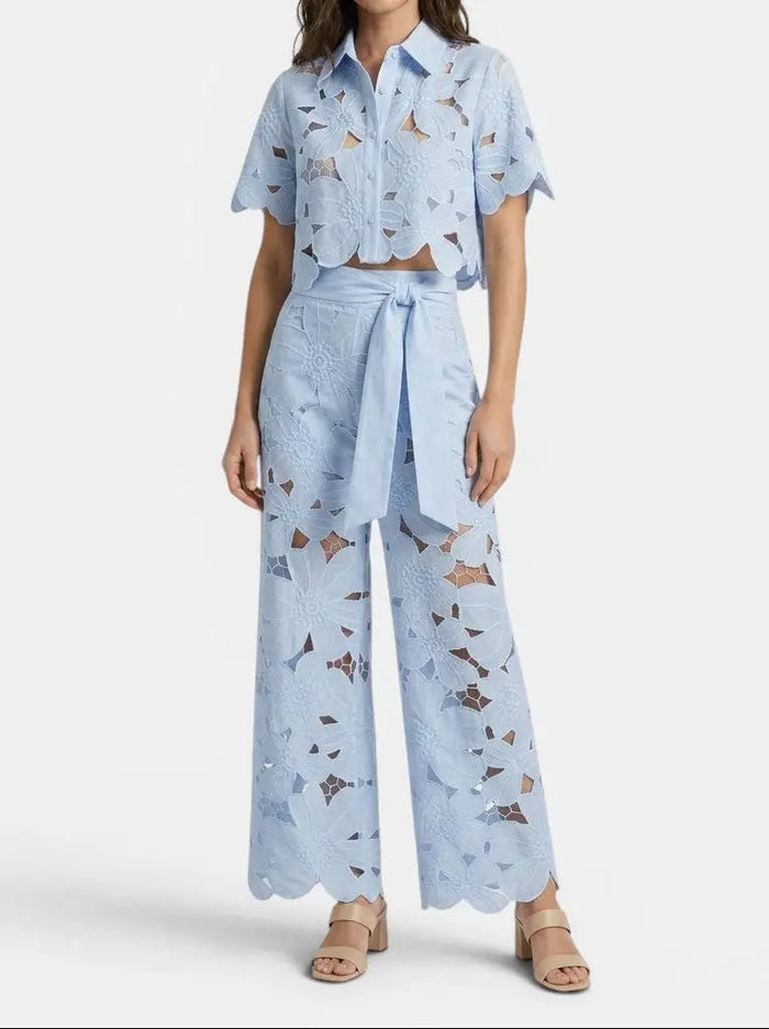 Women's floral lace co-ord set with elegant cropped top and wide-leg trousers, perfect for spring and summer.
