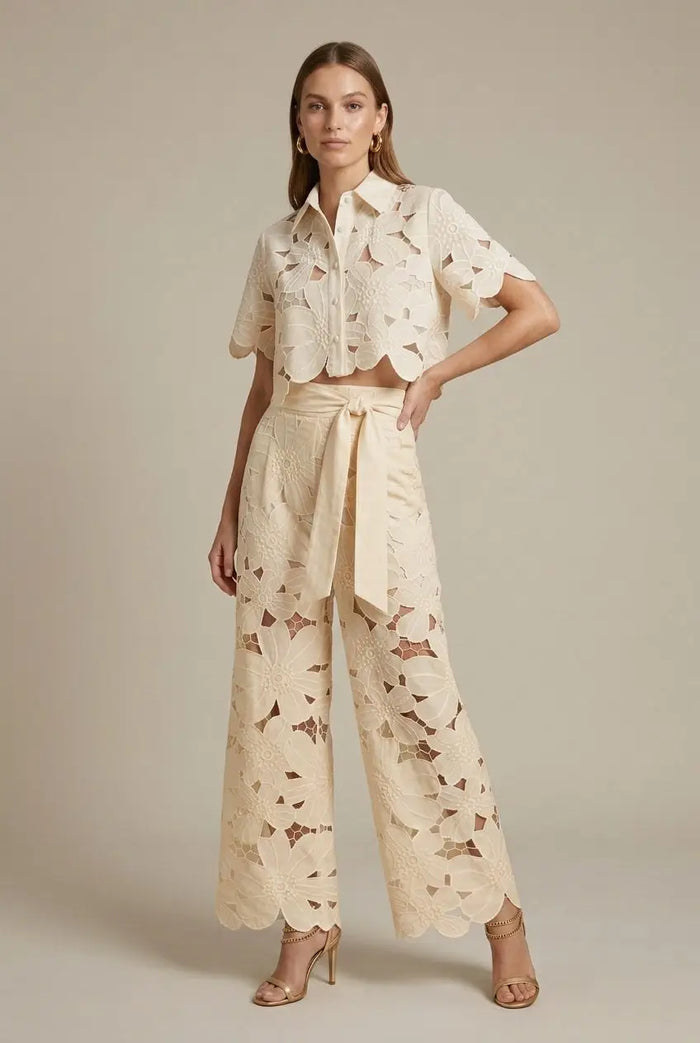 Women's floral lace two-piece set featuring an elegant cape overlay top and wide-leg trousers by LondonLaneStore.