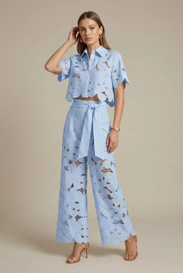 Women's floral lace two-piece set by LondonLaneStore featuring an elegant cape overlay top and wide-leg trousers, perfect for stylish occasions.