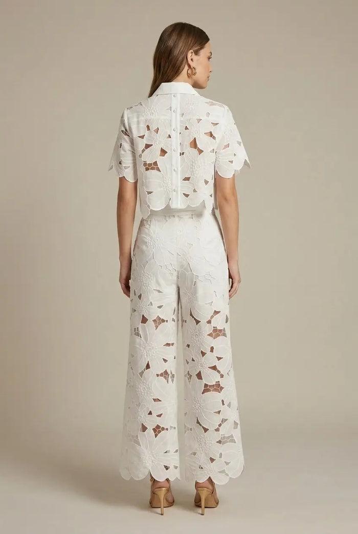 Women's floral lace two-piece set featuring an elegant cape overlay top and wide-leg trousers from LondonLaneStore.
